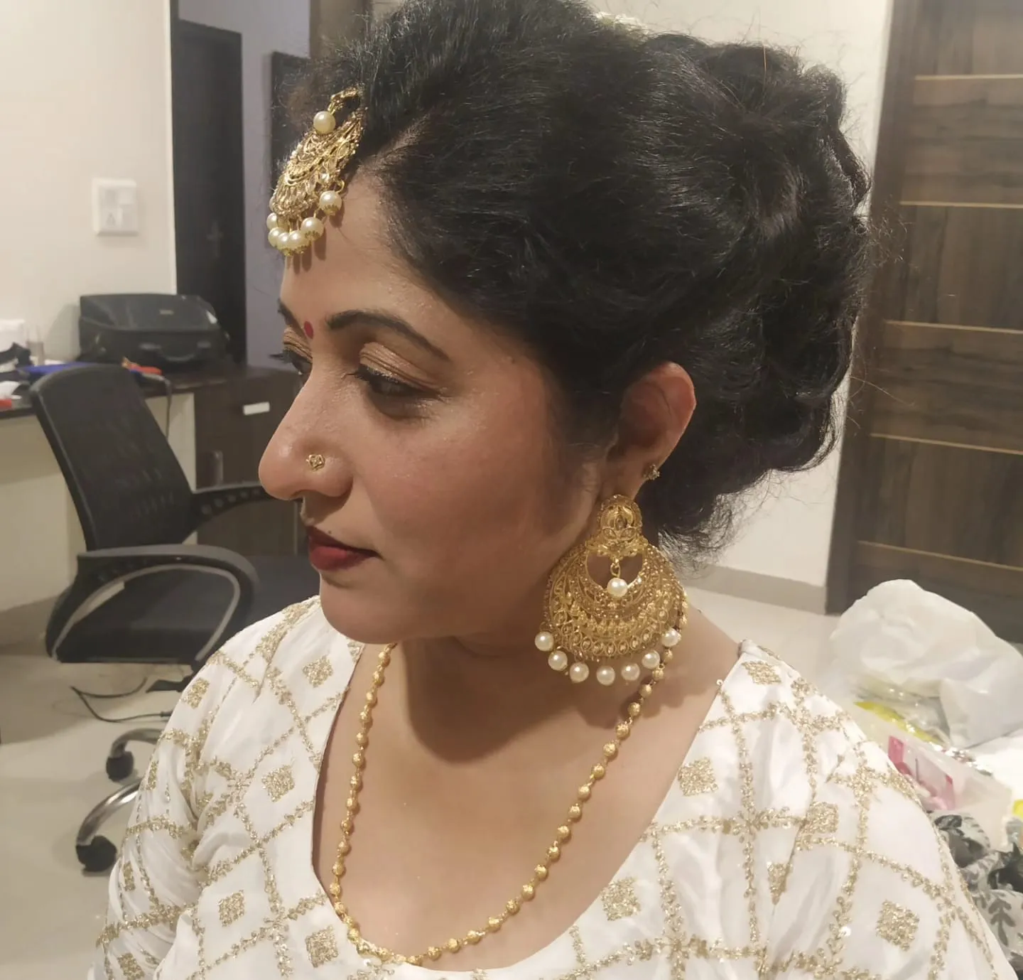 Party makeup with traditional jewellery
